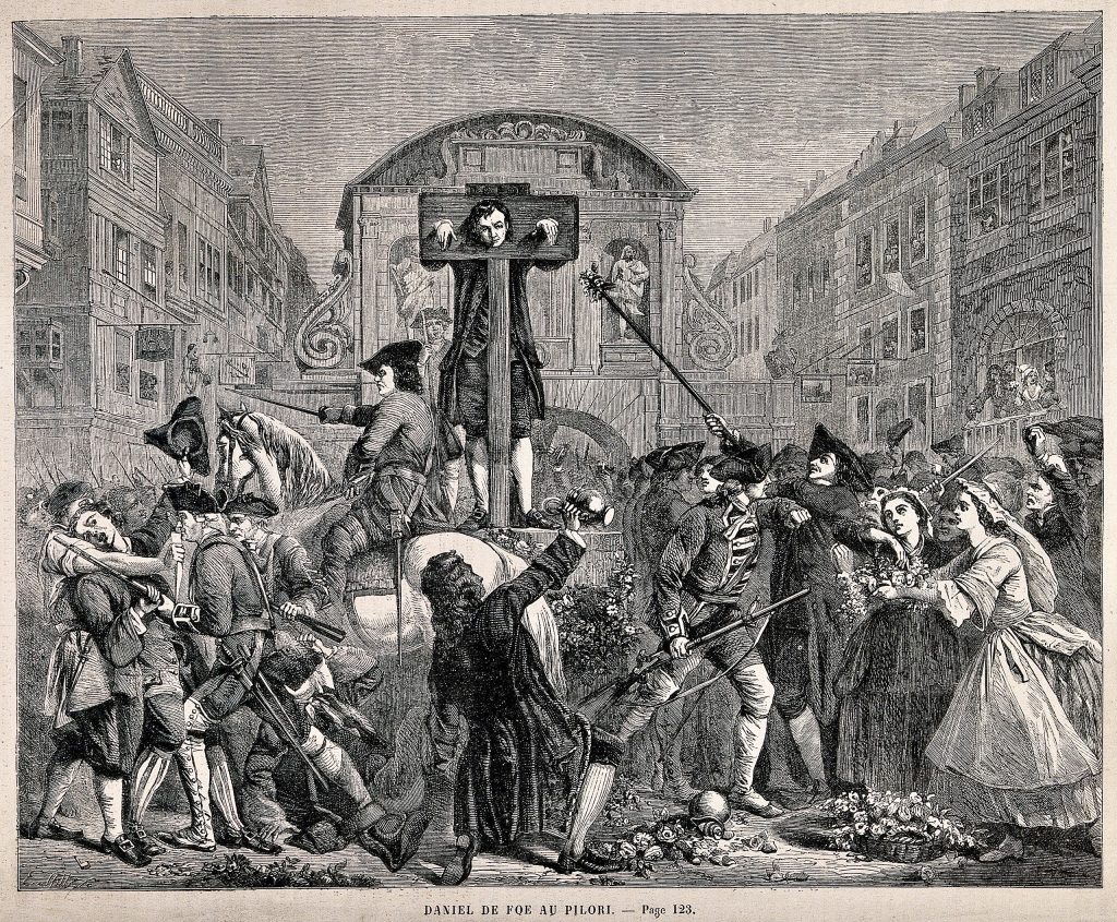 Daniel Defoe being pilloried for seditious libel in 1703. He was so popular that instead of stoning him, the crowd threw flowers, which can be seen on the ground.